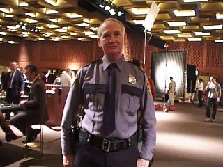 John Henley,Wardrobe: Casino Security Guard